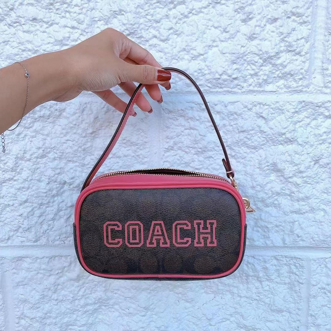Coach CB851 Jamie Wristlet In Signature Canvas In IM/Brown/Watermelon Coach CB851 Jamie Wristlet In Signature Canvas In IM/Brown/Watermelon